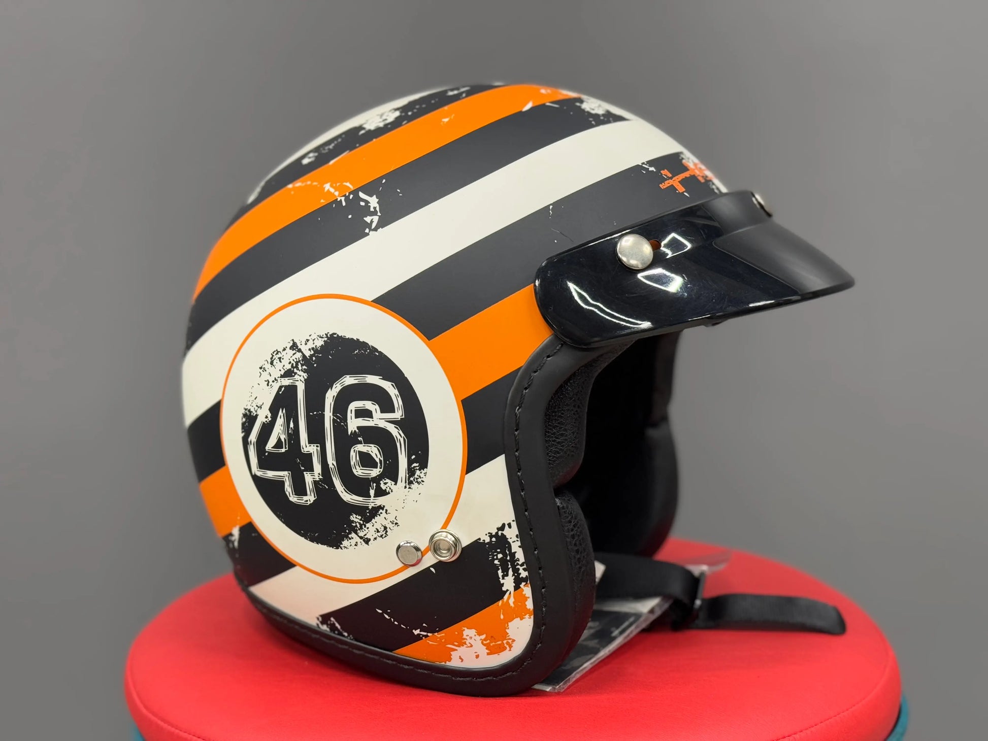 Held open-face helmet
