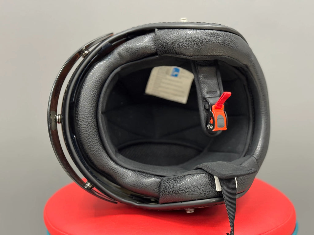 Held open-face helmet